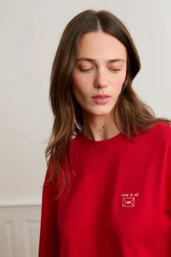 Camiseta de manga corta con la inscripción «love is all» de algodón