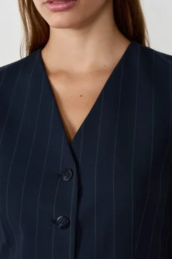 Chaleco sin mangas con botones