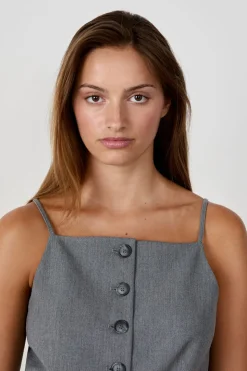 Chaleco sin mangas con botones