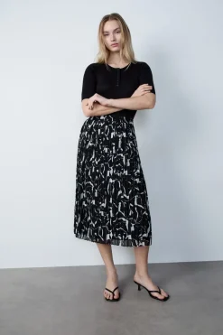 Falda larga plisada estampada