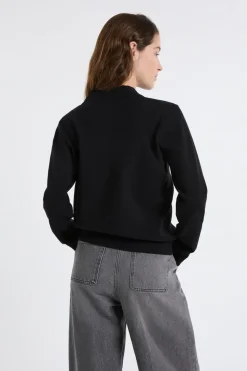 Jersey de cuello polo con botones dorados