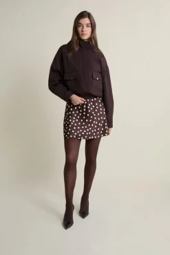 Jupe courte satinée à pois