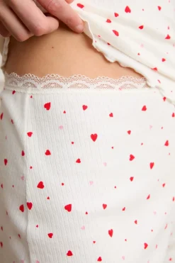 Pantalón corto de pijama de punto calado con estampado de corazones de algodón