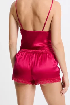 Pantalón corto de seda con detalles de encaje