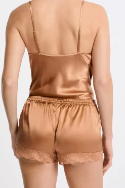 Pantalón corto de seda con detalles de encaje