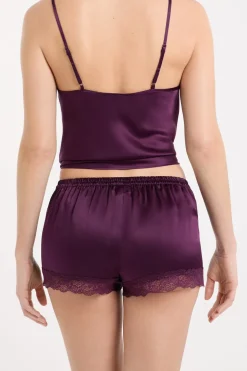 Pantalón corto de seda con detalles de encaje