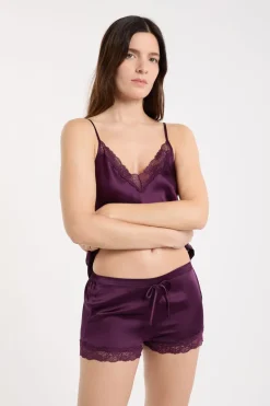 Pantalón corto de seda con detalles de encaje