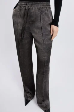 Pantalon large satiné à imprimé serpent