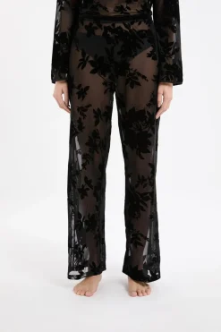 Pantalon transparent à motif floral
