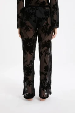 Pantalon transparent à motif floral