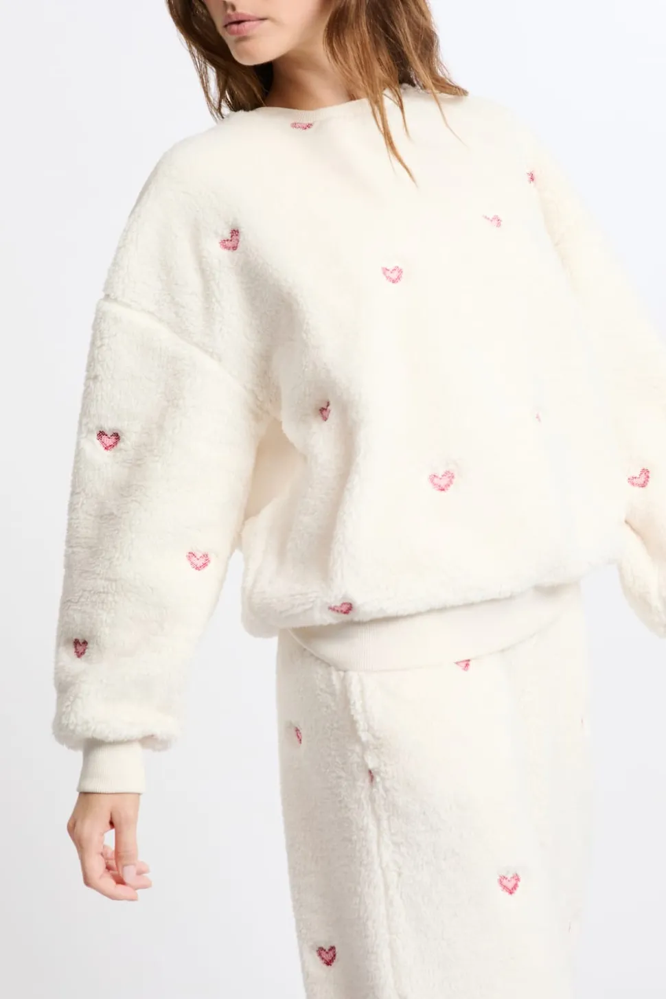 Sudadera con estampado de corazones efecto polar