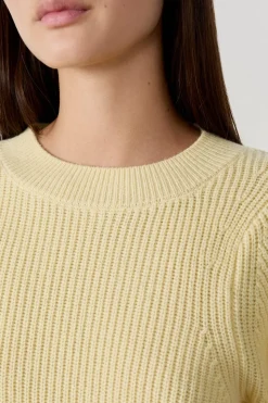 Suéter con mangas abullonadas