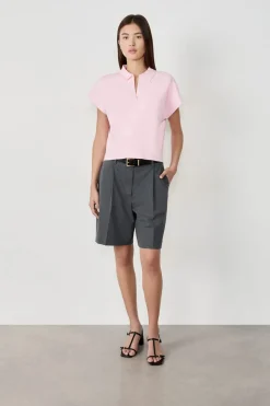 Suéter sin mangas cuello Polo