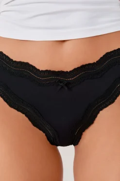 Tanga de microfibra con borde de encaje