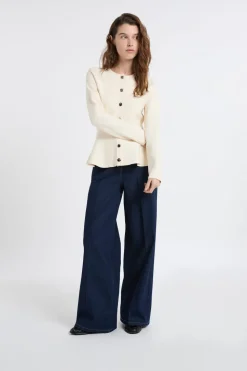 Top de manga larga con botones dorados