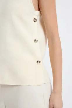 Top sin mangas de algodón con botones dorados