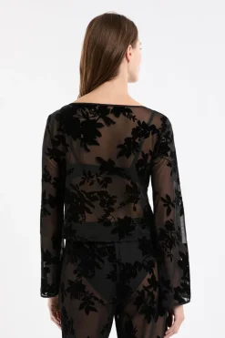 Top transparent à motif floral